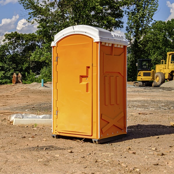 what is the cost difference between standard and deluxe portable restroom rentals in Alum Bridge